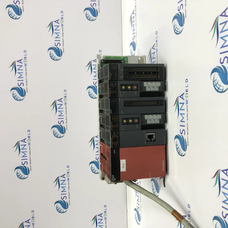 Mitsubishi PLC rack with modules, likely Mitsubishi MELSEC system PLC RACK